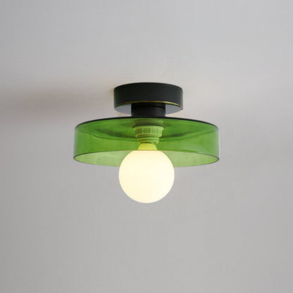 Bauhaus ceiling lamp featuring a minimalist design with a spherical glass shade and brass accents, perfect for modern bedroom decor. 10