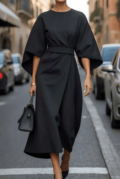 Belted black maxi dress for women featuring an elegant silhouette and long sleeves, perfect for weddings and special occasions. 2