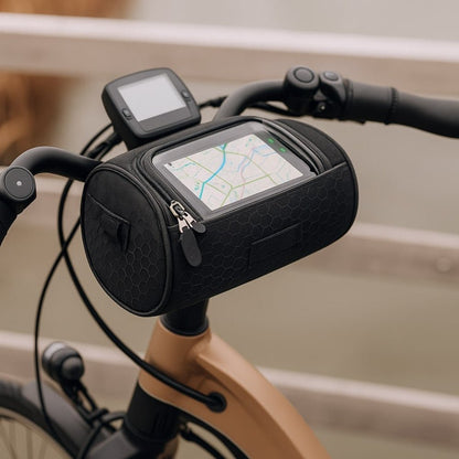 Bike handlebar bag featuring a secure phone holder, designed for waterproof storage of essentials while cycling. 0