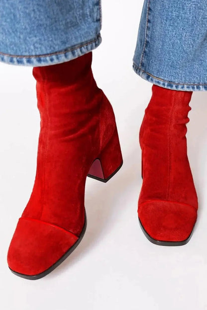 Black ankle boots for women featuring a stylish square toe and sturdy block heel, adorned with a chic animal print contrast panel for a trendy, fashionable look. 2
