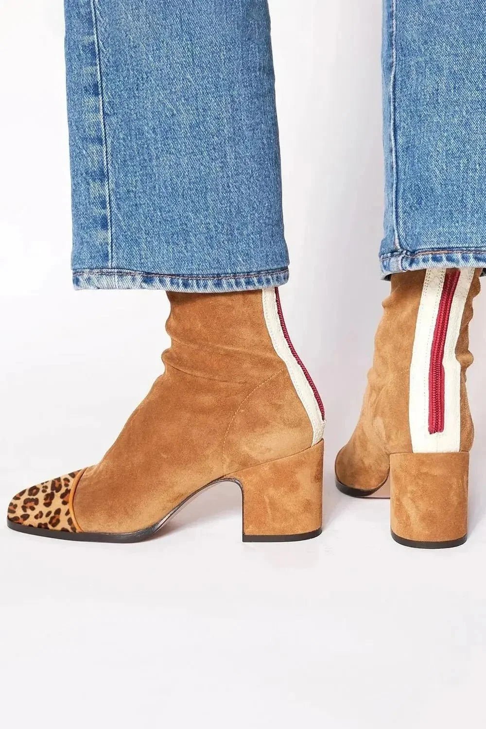 Black ankle boots for women featuring a stylish square toe and sturdy block heel, adorned with a chic animal print contrast panel for a trendy, fashionable look. 3