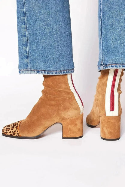 Black ankle boots for women featuring a stylish square toe and sturdy block heel, adorned with a chic animal print contrast panel for a trendy, fashionable look. 3
