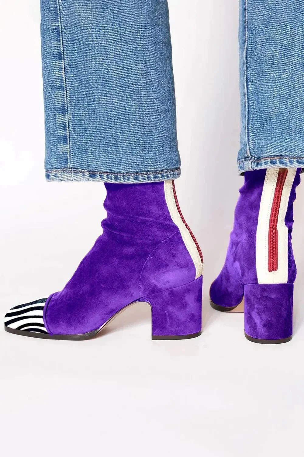 Black ankle boots for women featuring a stylish square toe and sturdy block heel, adorned with a chic animal print contrast panel for a trendy, fashionable look. 1