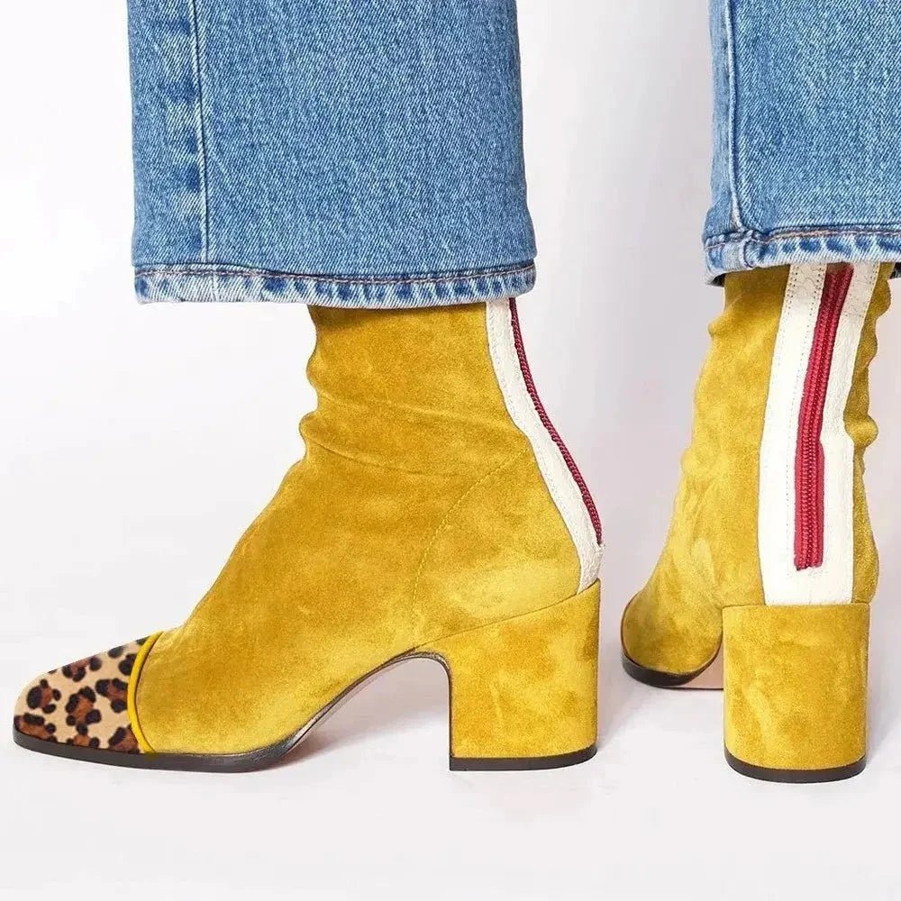 Black ankle boots for women featuring a stylish square toe and sturdy block heel, adorned with a chic animal print contrast panel for a trendy, fashionable look. 0