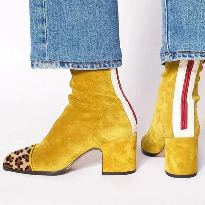 Black ankle boots for women featuring a stylish square toe and sturdy block heel, adorned with a chic animal print contrast panel for a trendy, fashionable look. 0