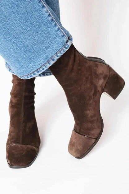 Black ankle boots for women featuring a stylish square toe and sturdy block heel, adorned with a chic animal print contrast panel for a trendy, fashionable look. 5