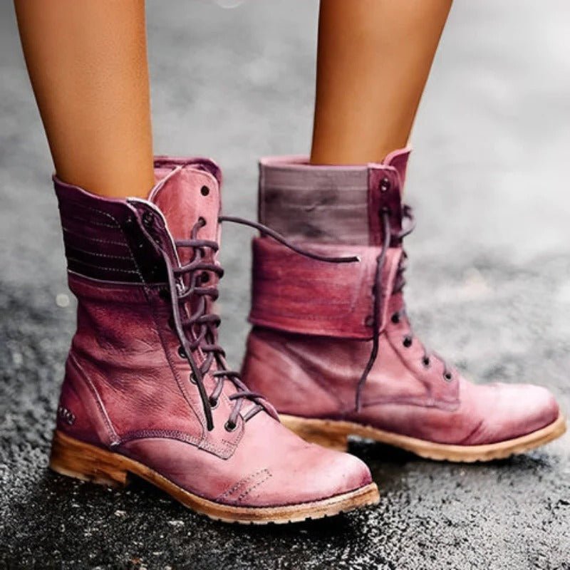 Black ankle boots for women featuring arch support and a non-slip sole, designed in a vintage distressed lace-up combat style. 0