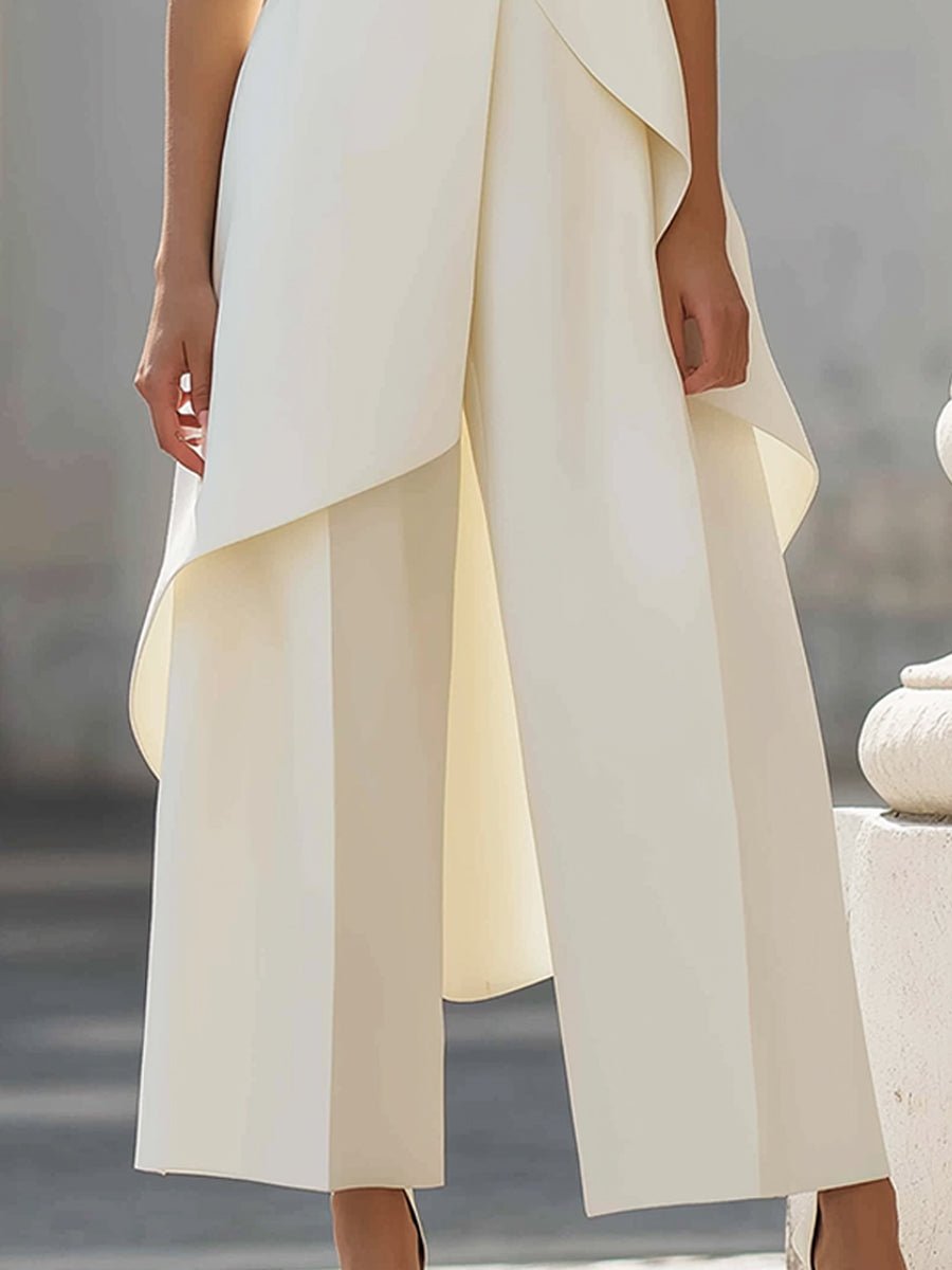 Elegant black jumpsuit for women featuring a high neckline and draped overlay, designed with a chic wide-leg silhouette, perfect for special occasions. 4