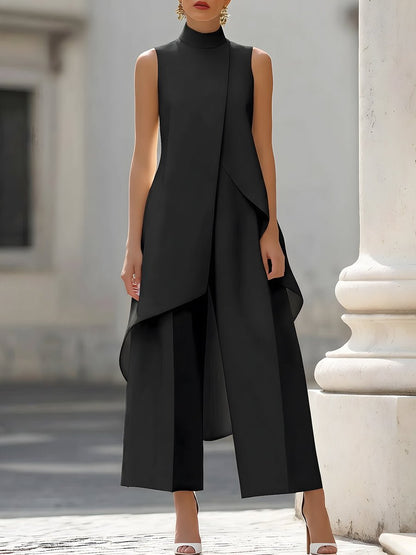 Elegant black jumpsuit for women featuring a high neckline and draped overlay, designed with a chic wide-leg silhouette, perfect for special occasions. 6