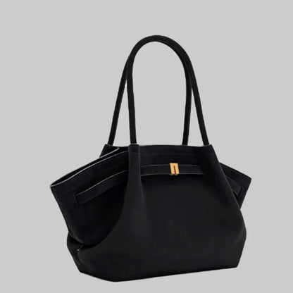 Elegant black shoulder bag with large capacity and adjustable straps, featuring a chic faux suede design for stylish women. 2