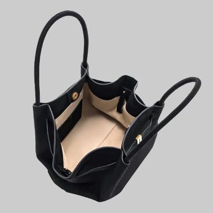 Elegant black shoulder bag with large capacity and adjustable straps, featuring a chic faux suede design for stylish women. 3