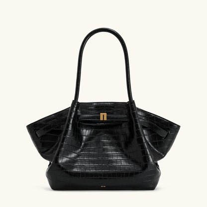 Elegant black shoulder bag with large capacity and adjustable straps, featuring a chic faux suede design for stylish women. 9