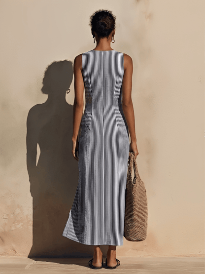 Blazer-style maxi dress featuring double-breasted gold buttons and nautical stripes, made from soft breathable fabric for a stylish and comfortable look. 4