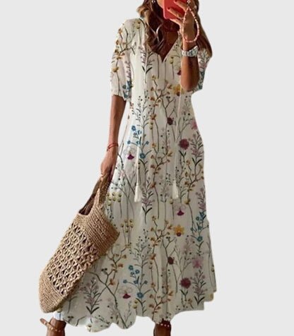Boho vintage summer dress featuring a flattering V-neckline, lightweight fabric, and versatile design perfect for casual outings or beach days. 6