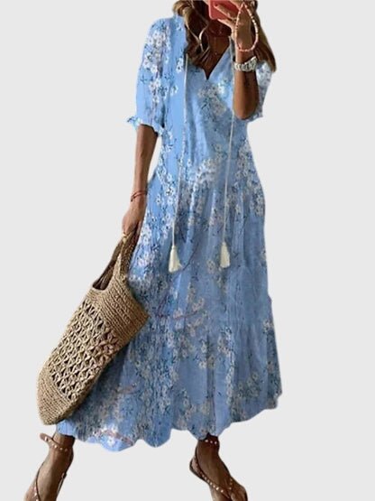 Boho vintage summer dress featuring a flattering V-neckline, designed with a lightweight and breezy fabric for effortless casual elegance. 4