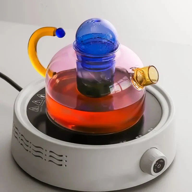 Borosilicate glass kettle mug set featuring an elegant modern design, includes a 400ml jug with a built-in filter and an 80ml 3