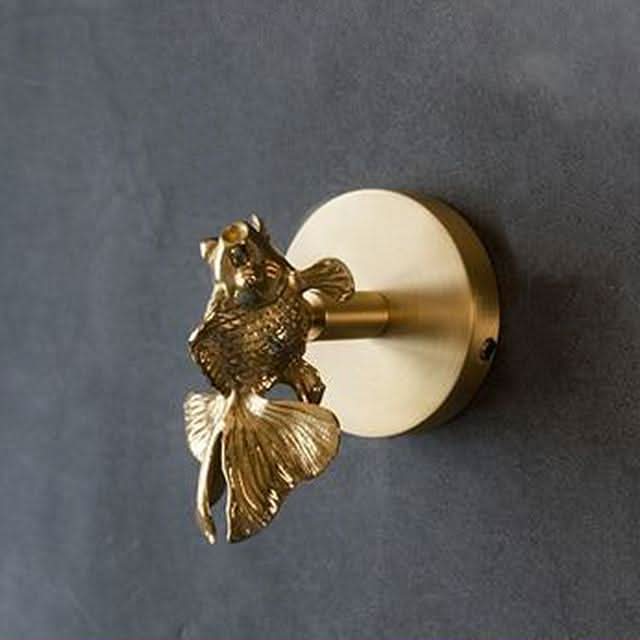 Brass animal wall hook rack with a gold finish, featuring decorative coat hooks perfect for enhancing home decor. 6