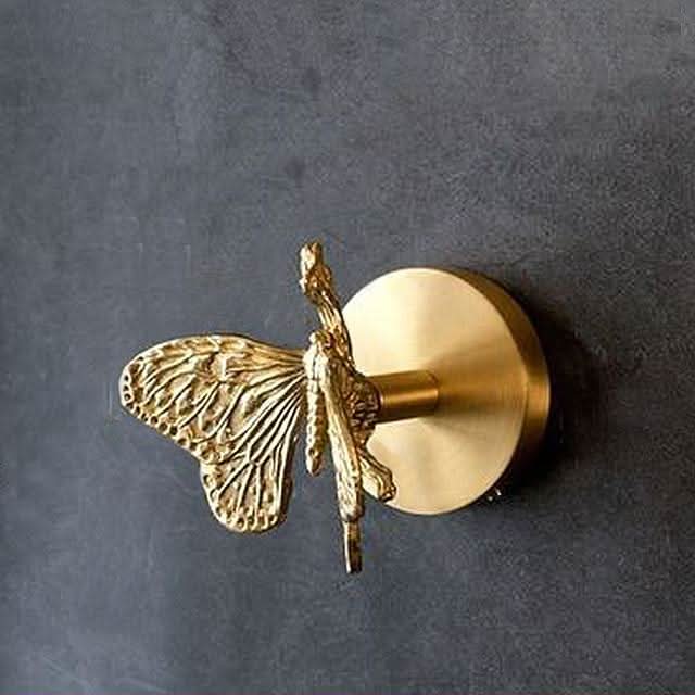 Brass animal wall hook rack with a gold finish, featuring decorative coat hooks perfect for enhancing home decor. 8