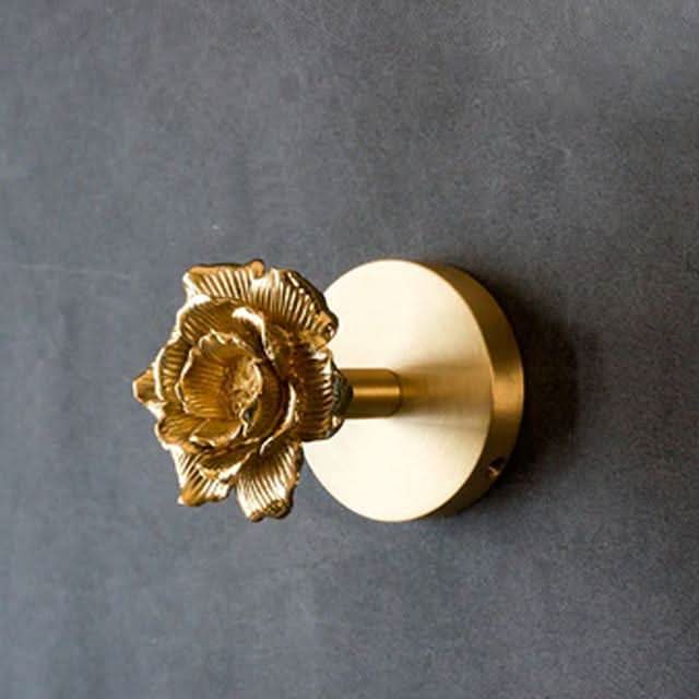 Brass animal wall hook rack with a gold finish, featuring decorative coat hooks perfect for enhancing home decor. 11
