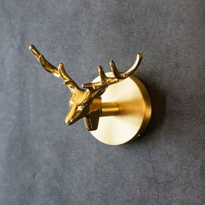 Brass animal wall hook rack with a gold finish, featuring decorative coat hooks perfect for enhancing home decor. 7