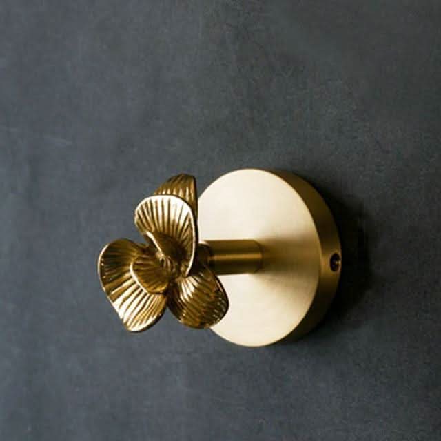 Brass animal wall hook rack with a gold finish, featuring decorative coat hooks perfect for enhancing home decor. 9