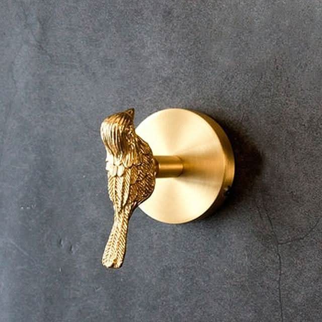 Brass animal wall hook rack with a gold finish, featuring decorative coat hooks perfect for enhancing home decor. 0