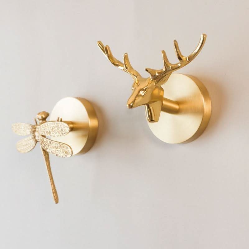 Brass animal wall hook rack with a gold finish, featuring decorative coat hooks perfect for enhancing home decor. 2
