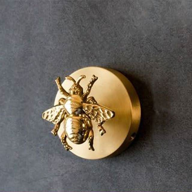 Brass animal wall hook rack with a gold finish, featuring decorative coat hooks perfect for enhancing home decor. 4