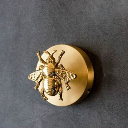 Brass animal wall hook rack with a gold finish, featuring decorative coat hooks perfect for enhancing home decor. 4