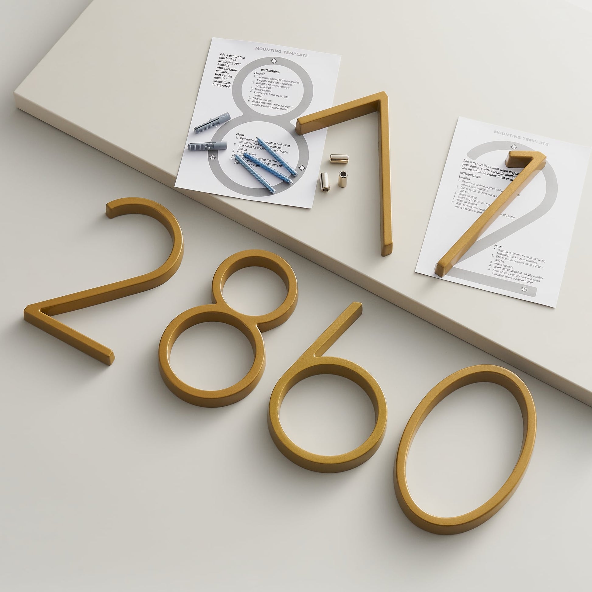 Elegant brass house numbers with a satin finish, designed for floating or flat installation, featuring a weather-resistant design for durability and style. 8