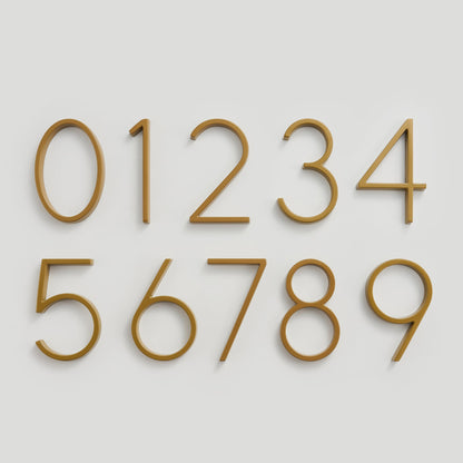 Elegant brass house numbers with a satin finish, designed for floating or flat installation, featuring a weather-resistant design for durability and style. 4