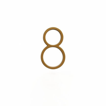 Elegant brass house numbers with a satin finish, designed for floating or flat installation, featuring a weather-resistant design for durability and style. 11