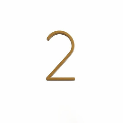 Elegant brass house numbers with a satin finish, designed for floating or flat installation, featuring a weather-resistant design for durability and style. 17