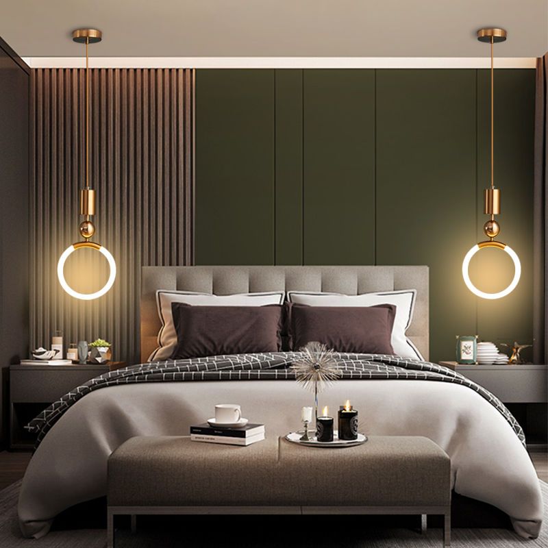 Brass pendant light featuring a minimalist design, ideal for illuminating a kitchen island with a Nordic aesthetic. 5