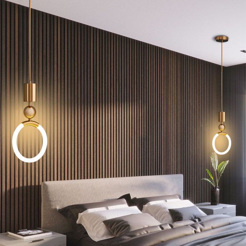Brass pendant light featuring a minimalist design, ideal for illuminating a kitchen island with a Nordic aesthetic. 4