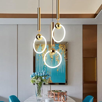 Brass pendant light featuring a minimalist design, ideal for illuminating a kitchen island with a Nordic aesthetic. 2