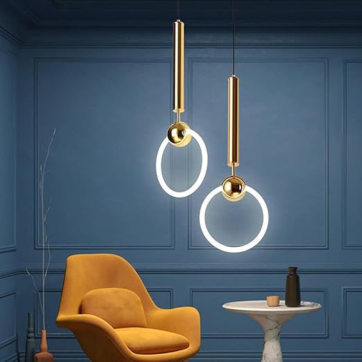 Brass pendant light featuring a minimalist design, ideal for illuminating a kitchen island with a Nordic aesthetic. 3
