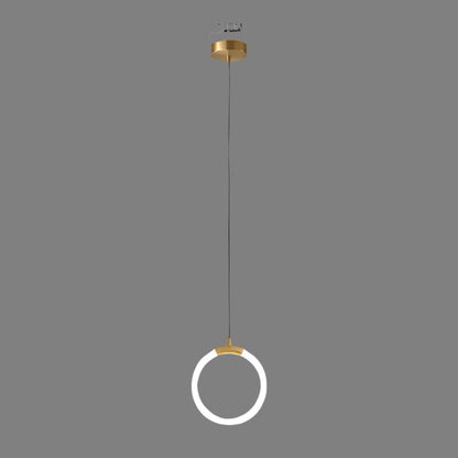 Brass pendant light featuring a minimalist design, ideal for illuminating a kitchen island with a Nordic aesthetic. 0