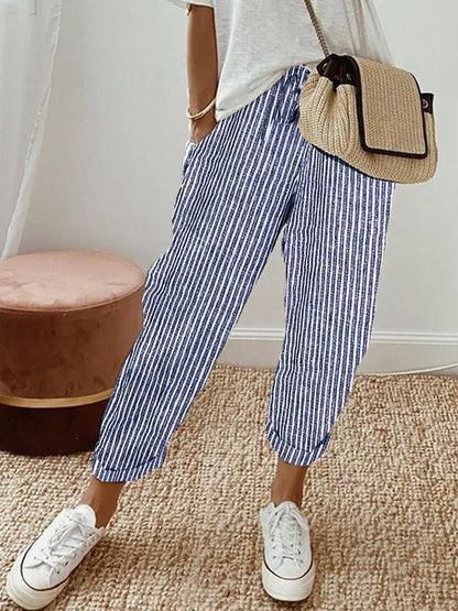 Breathable high-waist pants featuring a flowing silhouette and smooth finish, crafted from lightweight fabric for ultimate comfort and versatility. 8
