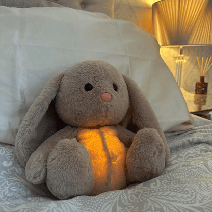 Calming plush toy featuring soothing breathing sounds and relaxing music, designed for stress relief, ultra-soft texture, suitable for all ages. 2