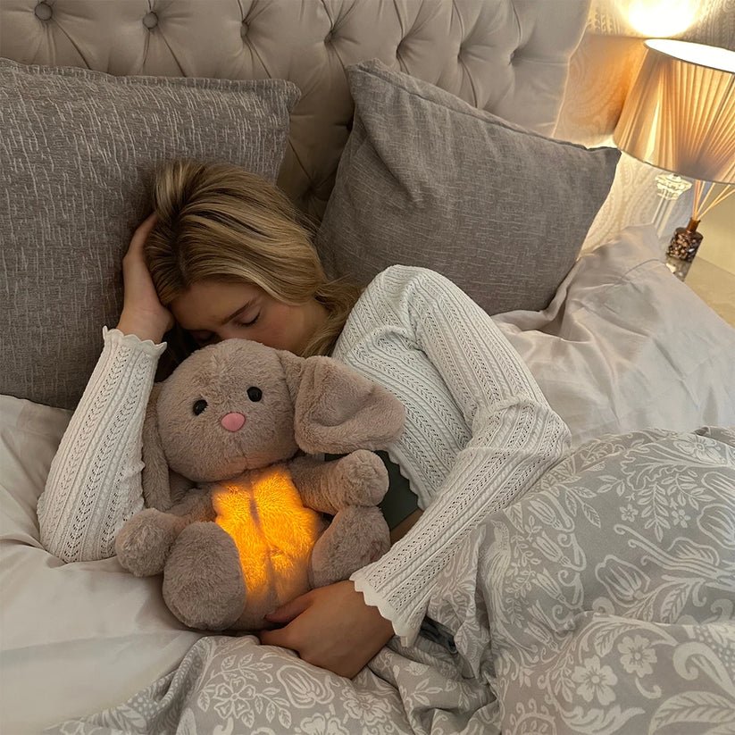 Calming plush toy featuring soothing breathing sounds and relaxing music, designed for stress relief, ultra-soft texture, suitable for all ages. 3