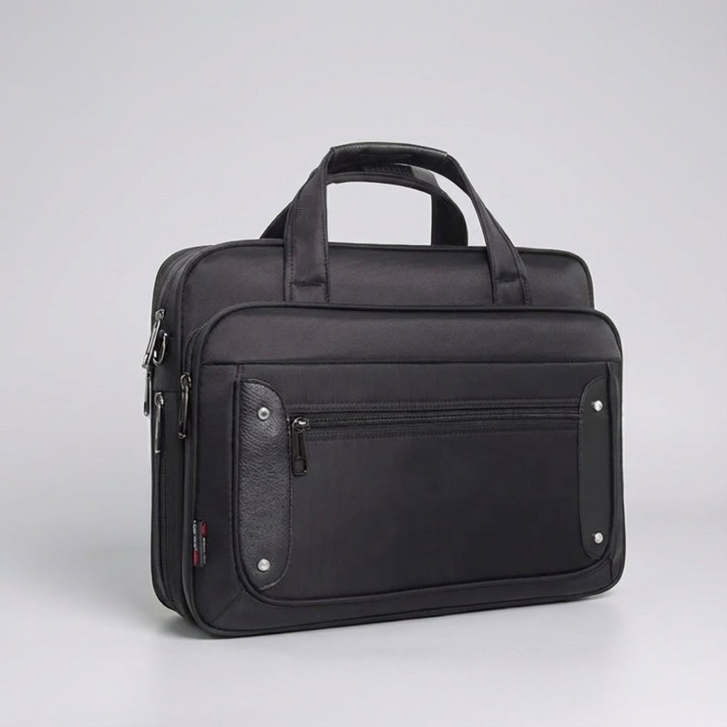 Canvas laptop bag featuring a multi-pocket design and adjustable strap, suitable for 14 to 19 inch laptops, ideal for work or travel. 2