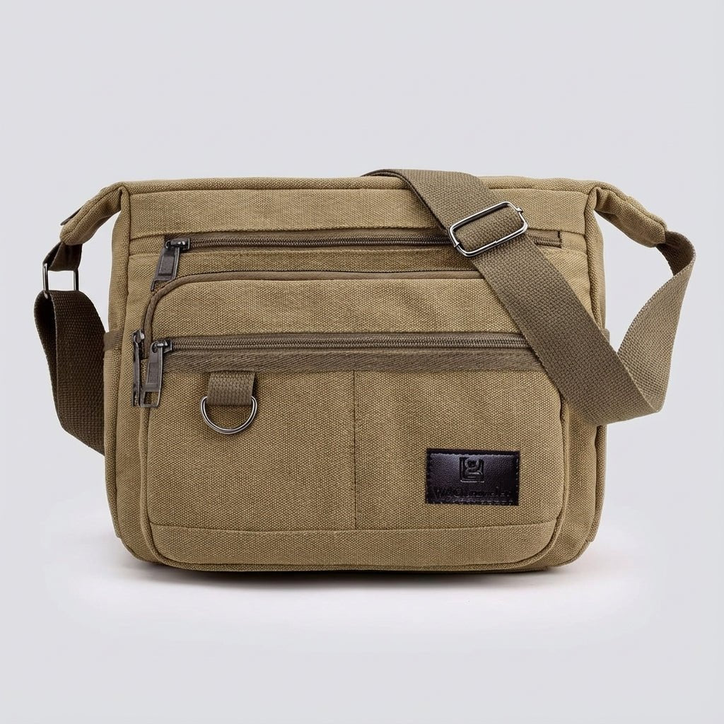 Canvas messenger bag featuring RFID blocking technology, multiple compartments for organization, and a durable waxed design for everyday use. 8