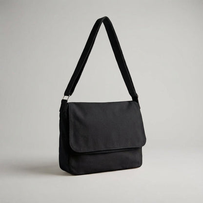 Canvas shoulder bag featuring an adjustable strap and spacious compartments, made from durable cotton polyester, ideal for everyday use and travel. 4
