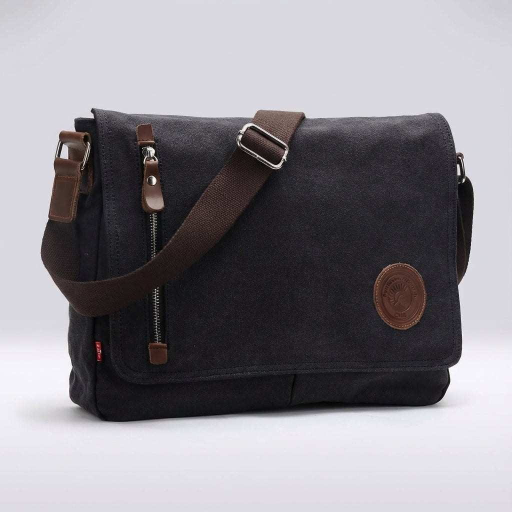 Canvas shoulder bag featuring a padded tablet compartment, designed for waterproof and scratch-resistant durability, ideal for everyday use and travel. 0