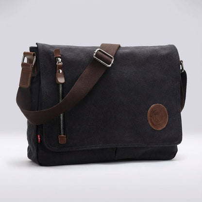 Canvas shoulder bag featuring a padded tablet compartment, designed for waterproof and scratch-resistant durability, ideal for everyday use and travel. 0