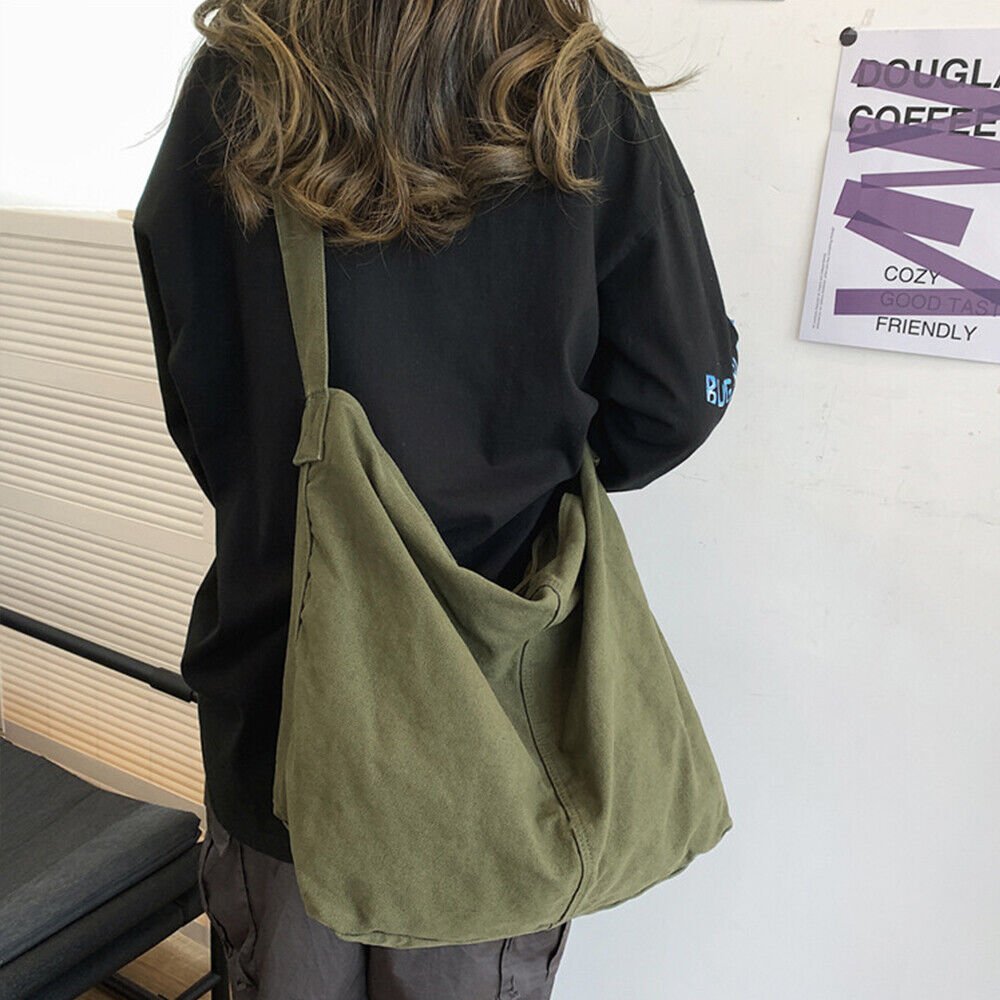 Canvas tote bag featuring a roomy design, made from durable nylon, perfect for beach outings and everyday use. 0