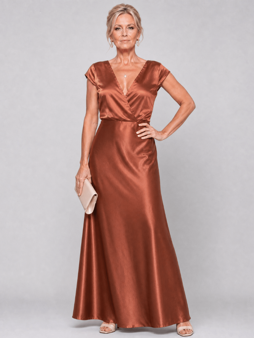 Elegant white cap sleeve maxi dress featuring a wrap bodice and flattering V neckline, perfect for formal occasions and summer events. 4