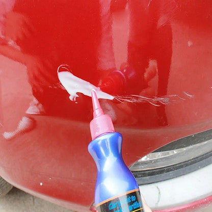 Car Scratch Remover with Polishing Pad featuring a non-abrasive formula designed for easy repair of car paint scratches, showcasing its effective application on a 2