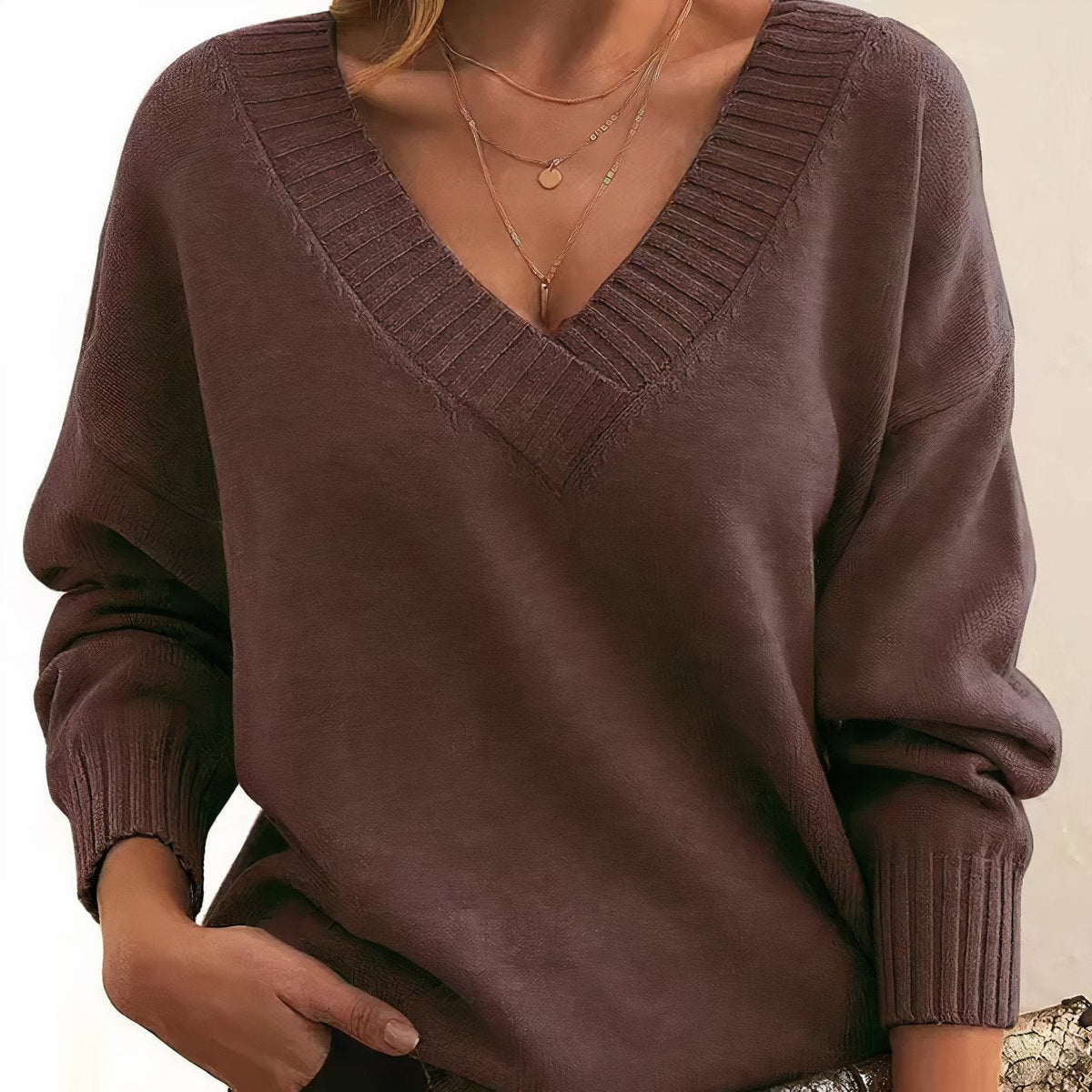Soft cashmere blend women's sweater featuring a deep V-neck and relaxed fit, perfect for everyday comfort and style. 10